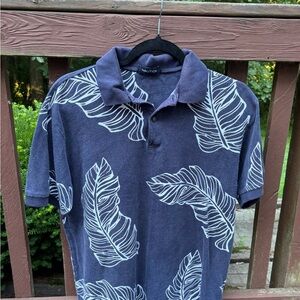 Nautica Men’s Navy Polo short sleeve with White Leaf Design size Medium